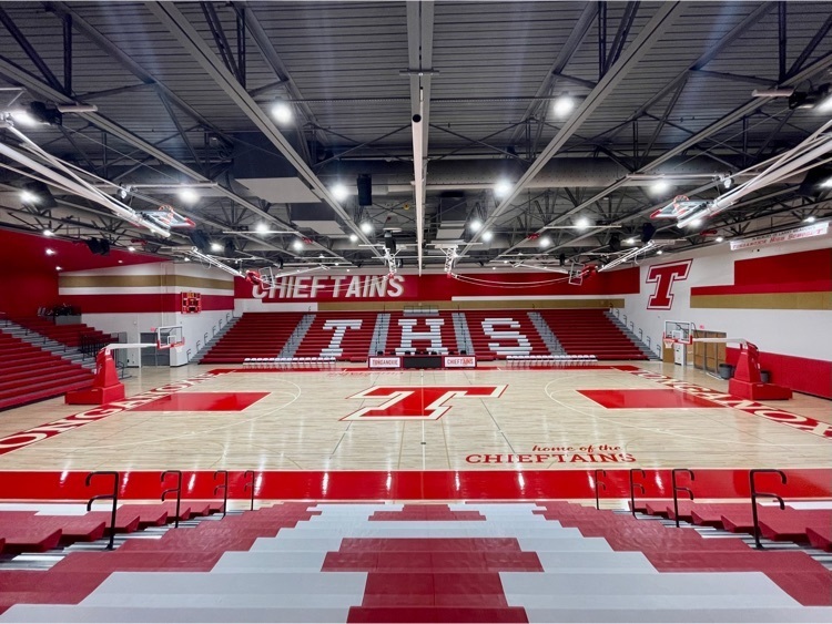 interior of high school gymnasium; view from top of bleachers  