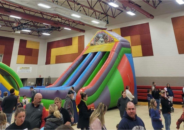 large multi colored inflatable slide 