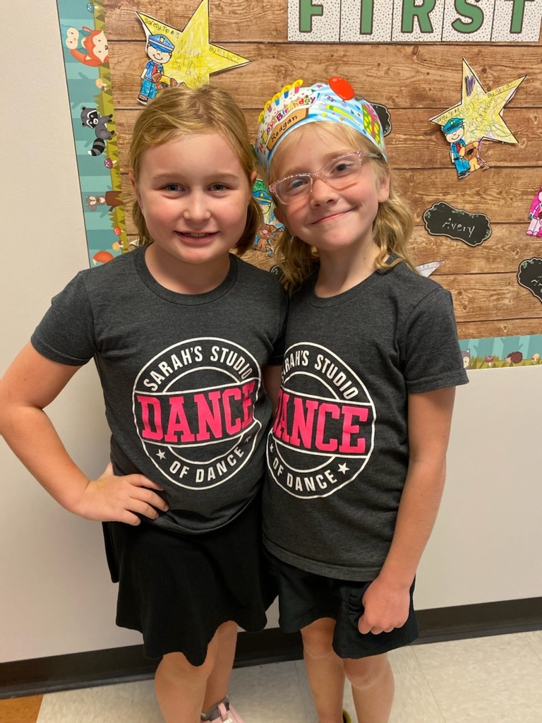 two students wearing Sarah's Studio of Dance t shirts